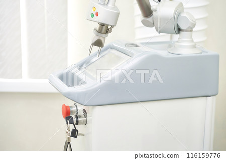 Face procedure device. Professional dermatologist uses modern technology laser 116159776