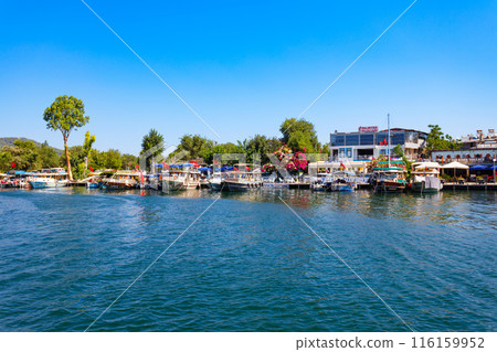 Boats at Dalyan river in Dalyan town, Turkey Boats at Dalyan river in Dalyan town, Turkey 116159952