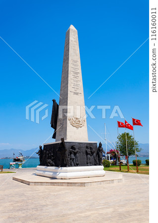 Memorial obelisk monument at the Ataturk central square of Fethiye city, Turkey Memorial obelisk monument at the Ataturk central square of Fethiye city, Turkey 116160011
