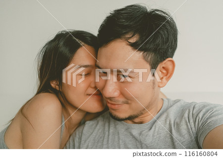 Selfie shot of asian sweet couple lover watching movie together. Selfie shot of asian sweet couple lover watching movie together. 116160804