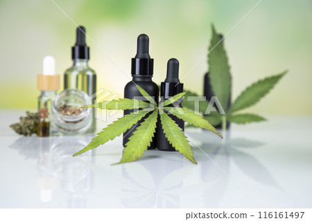 Cannabis leaf with hemp seeds and marijuana oil, cbd Cannabis leaf with hemp seeds and marijuana oil, cbd 116161497