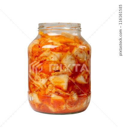 Kimchee in a glass jar isolated. Spicy kim chi, hot fermented napa cabbage, jimchi, korean gimchi Kimchee in a glass jar isolated. Spicy kim chi, hot fermented napa cabbage, jimchi, korean gimchi 116161585