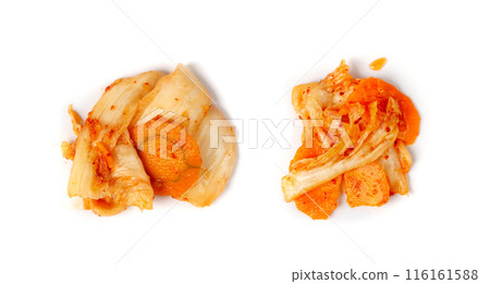 Kimchee isolated. Spicy kim chi pile, hot fermented napa cabbage, traditional jimchi, korean gimchi Kimchee isolated. Spicy kim chi pile, hot fermented napa cabbage, traditional jimchi, korean gimchi 116161588