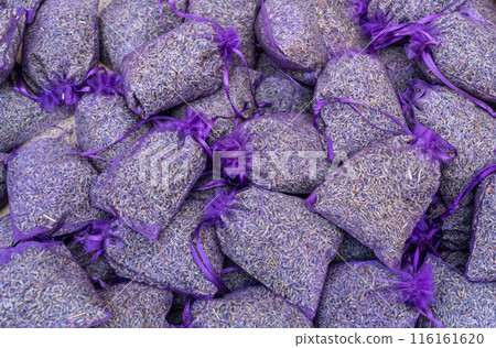 Dry lavender flowers in many bags, lavandula perfume buds, petals, fragrance lilac blossoms 116161620