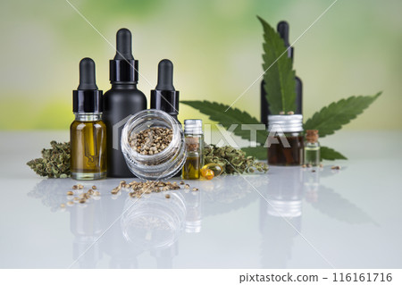 Cannabis leaf with hemp seeds and marijuana oil, cbd Cannabis leaf with hemp seeds and marijuana oil, cbd 116161716