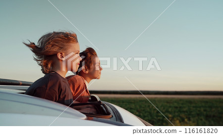 Funny Happy Little Boys Stands In Open Car Sunroof During Trip, Summer.Childhood 116161820