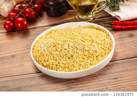Italian raw dry pasta risoni Italian raw dry pasta risoni 116161975