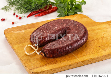 Delicious dry cured beef basturma on table, closeup Delicious dry cured beef basturma on table, closeup 116162021