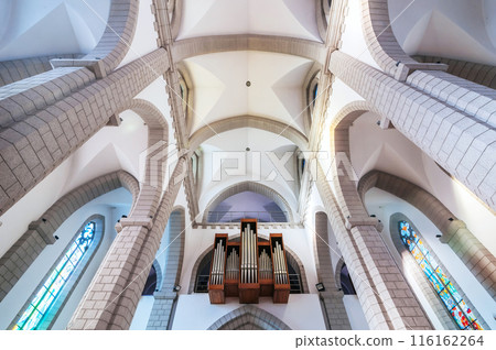 interior of Catholic church with organ pipes. Sacred Heart of Jesus Cathedral in Tashkent in Uzbekistan 116162264
