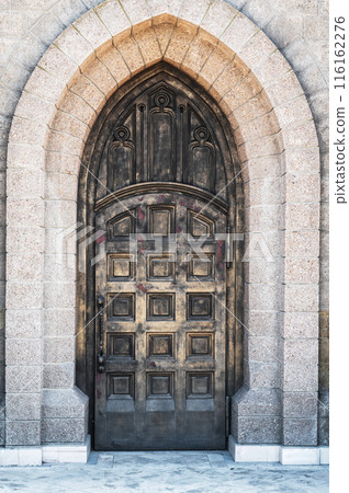 ancient iron door to Cathedral of the Sacred Heart of Jesus in Tashkent in Uzbekistan ancient iron door to Cathedral of the Sacred Heart of Jesus in Tashkent in Uzbekistan 116162276