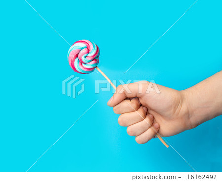 Color lollipop, spiral candy on stick, colorful striped lollypop, round fruit caramel, circle lollipop 116162492