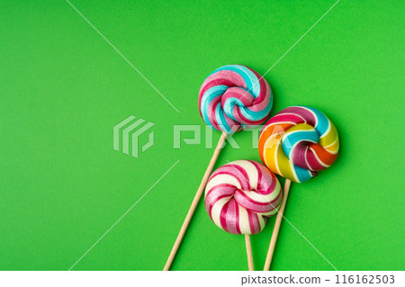 Color lollipop, spiral candy on stick, colorful striped lollypop, round fruit caramel, circle lollipop Color lollipop, spiral candy on stick, colorful striped lollypop, round fruit caramel, circle lollipop 116162503