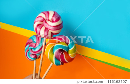 Color lollipop, spiral candy on stick, colorful striped lollypop, round fruit caramel, circle lollipop Color lollipop, spiral candy on stick, colorful striped lollypop, round fruit caramel, circle lollipop 116162507
