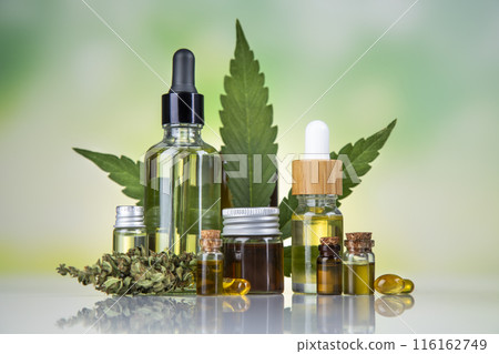 Cannabis leaf with hemp seeds and marijuana oil, cbd Cannabis leaf with hemp seeds and marijuana oil, cbd 116162749