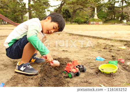 Children playing in the sandbox Children playing in the sandbox 116163252