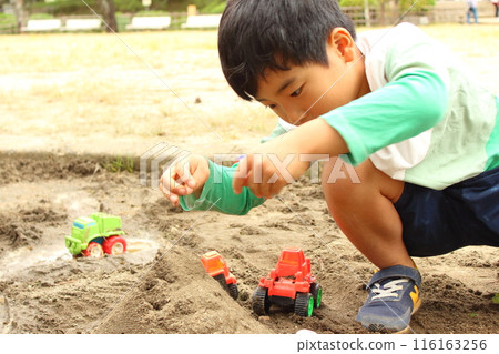 Children playing in the sandbox Children playing in the sandbox 116163256