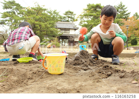 Children playing in the sandbox 116163258