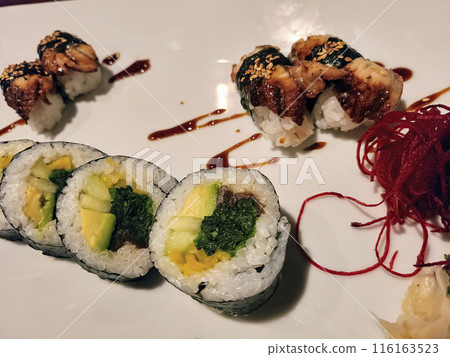 Elegant Sushi Platter with Maki Rolls and Eel Nigiri - Eye-Level View 116163523