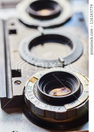 Vintage Camera Lens and Focusing Ring Close-Up 116163774
