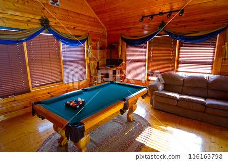 Cozy Rustic Cabin Interior with Pool Table and Leather Sofa in Tennessee 116163798
