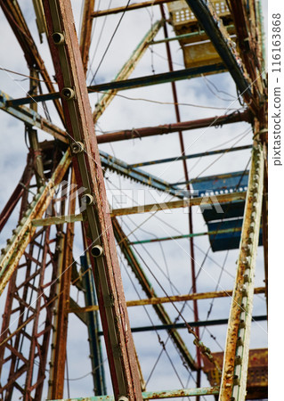 Abandoned Ferris Wheel, Rustic Decay, Cloudy Sky Perspective 116163868