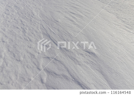 drifts of pure white snow after a snowfall drifts of pure white snow after a snowfall 116164548