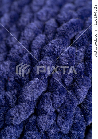 new soft blue threads with traces of other threads in close-up new soft blue threads with traces of other threads in close-up 116164628