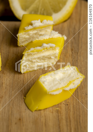 sweet dessert made of soft cheese with lemon flavor sweet dessert made of soft cheese with lemon flavor 116164970