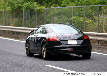 sports car running in the city 116165370