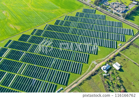 Solar panels on field in summer, aerial drone view 116166762