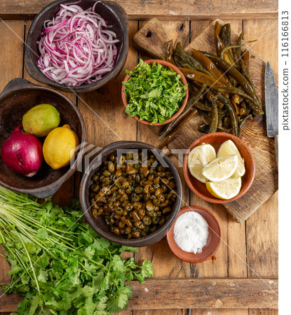 Ingredientes for seaweed cochayuyo seviche cebiche Chilean Australin peruvian cochayuyo, red onion, cilantro and lemon Ingredientes for seaweed cochayuyo seviche cebiche Chilean Australin peruvian cochayuyo, red onion, cilantro and lemon 116166813