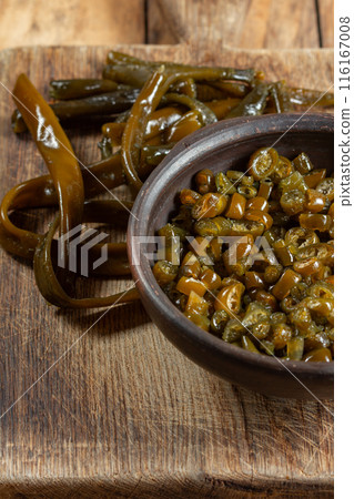 Chilean Australin peruvian seaweed COCHAYUYO. Choped cooked cochayuyo in bowl 116167008