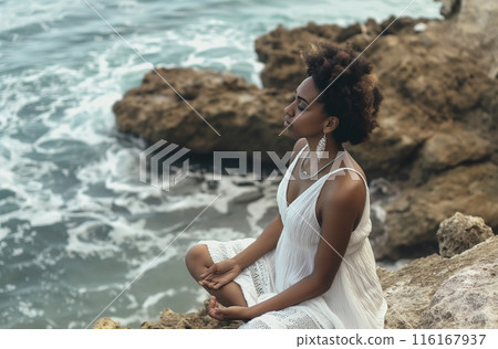 Ocean meditation in white dress 116167937