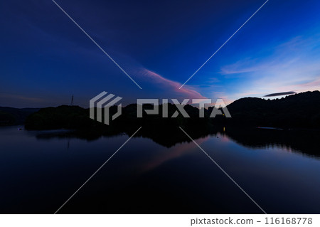 Evening view of Nunome Dam in the summer of 2024. Wide-angle shot from before sunset through golden hour to blue hour. Blue hour ⑩ 116168778