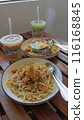 tasty spaghetti with seafood 116168845