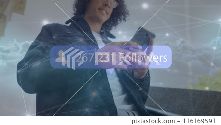 Image of increasing followers on a speech bubble over over biracial man using a smartphone Image of increasing followers on a speech bubble over over biracial man using a smartphone 116169591