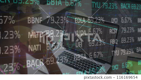 Image of stock market data processing over rear view of biracial woman using laptop at office Image of stock market data processing over rear view of biracial woman using laptop at office 116169654