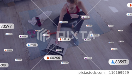 Image of notification bars over caucasian woman using laptop at completing exercise at home Image of notification bars over caucasian woman using laptop at completing exercise at home 116169939