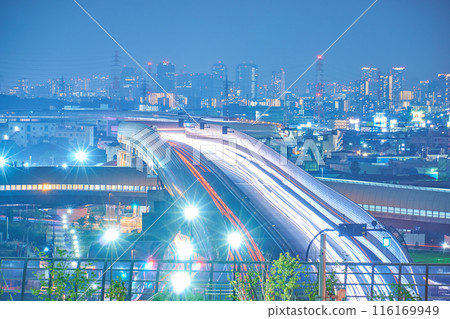 Night view of highway and buildings Night view of highway and buildings 116169949