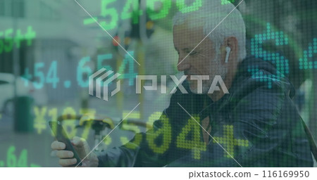 Image of trading board, senior caucasian man wearing headphones and scrolling on cellphone 116169950