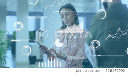 Image of data processing over african american woman discussing with male colleague at office Image of data processing over african american woman discussing with male colleague at office 116170092