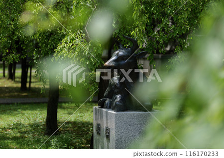 Petting the cow at Tenjin Shrine 116170233
