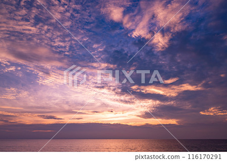 Nature beautiful Light Sunset or sunrise over sea, Colorful dramatic majestic scenery Sky with Amazing clouds and waves in sunset sky 116170291