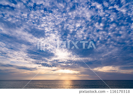 Nature beautiful Light Sunset or sunrise over sea, Colorful dramatic majestic scenery Sky with Amazing clouds and waves in sunset sky 116170318