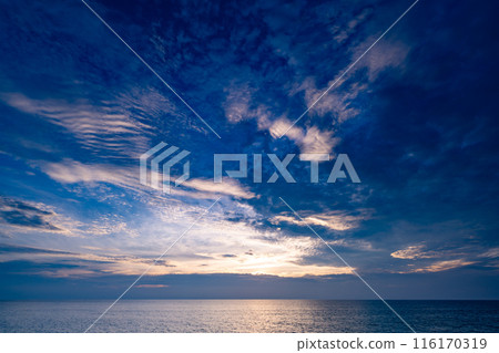 Nature beautiful Light Sunset or sunrise over sea, Colorful dramatic majestic scenery Sky with Amazing clouds and waves in sunset sky Nature beautiful Light Sunset or sunrise over sea, Colorful dramatic majestic scenery Sky with Amazing clouds and waves in sunset sky 116170319