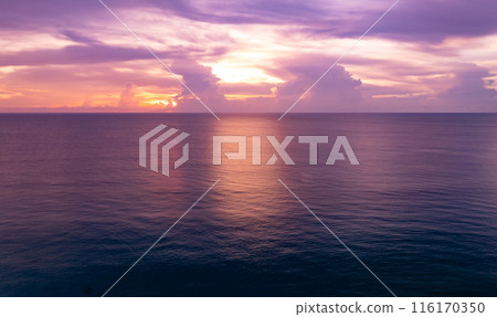 Nature beautiful Light Sunset or sunrise over sea, Colorful dramatic majestic scenery Sky with Amazing clouds and waves in sunset sky 116170350