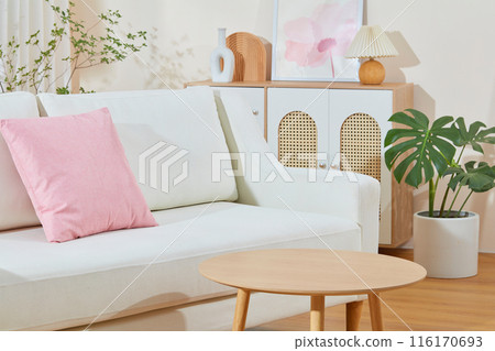 The photo of living room scene was taken from front angle with a blank wooden table for product displaying and many essential furniture decorated in back. Blank space for adding design elements The photo of living room scene was taken from front angle with a blank wooden table for product displaying and many essential furniture decorated in back. Blank space for adding design elements 116170693