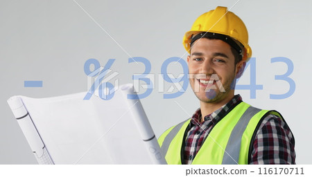 Image of plus, minus, percentile symbols, caucasian engineer wearing helmet looking at blueprint 116170711