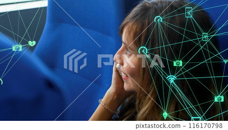 Image of connected icons globes, caucasian woman talking on cellphone while travelling in train 116170798