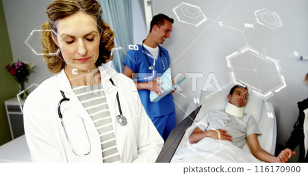 Image of chemical structures against caucasian female doctor reading medical reports at hospital 116170900
